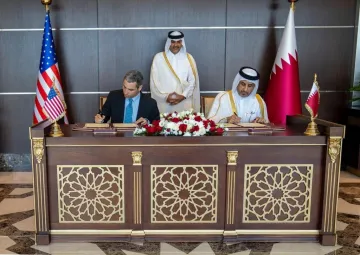 Under Secretary Silvers signs agreements with officials of the Qatari government 