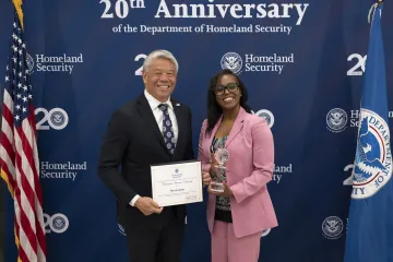 DHS Deputy Secretary John Tien with Secretary’s Award for Volunteer Service recipient, Mary Jackman.