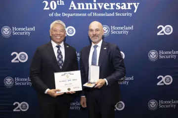 DHS Deputy Secretary John Tien and Secretary's Gold Medal recipient Jeffrey DaRin.