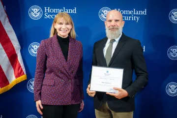 Acting DHS Deputy Secretary Kristie Canegallo with Innovation Award recipient, Bruce Shortnacy.