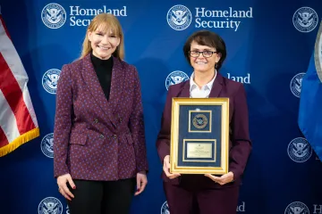 Acting DHS Deputy Secretary Kristie Canegallo with Leadership Excellence Award recipient, Amy Nicewick.