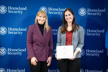 Acting DHS Deputy Secretary Kristie Canegallo with Innovation Award recipient, Katie Ross.