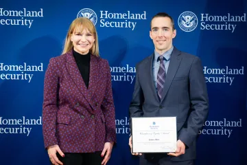 Acting DHS Deputy Secretary Kristie Canegallo with Champion of Equity Award recipient, James Allen.