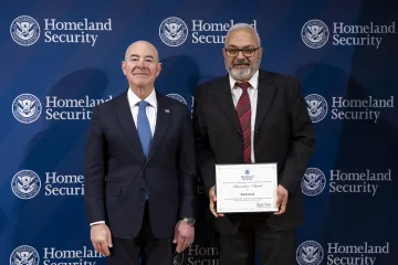 DHS Secretary Alejandro Mayorkas with Innovation Award recipient, Bobby Jerath.