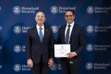 DHS Secretary Alejandro Mayorkas with Innovation Award recipient, Daniel Delgado.