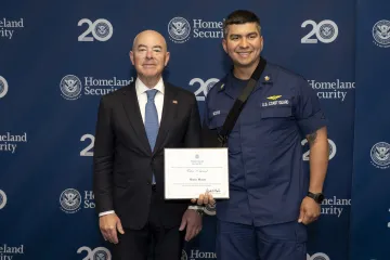 DHS Secretary Alexandro Mayorkas with Valor Award recipient, Shane Moore.