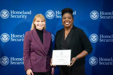 Acting DHS Deputy Secretary Kristie Canegallo with Champion of Equity Award recipient, Kimberly Bandy.