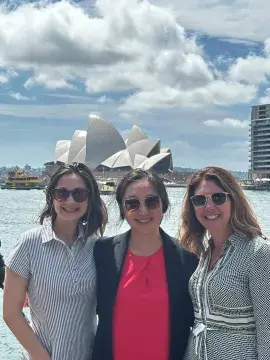 Caption: DHS Principal Director Kristen Best and delegation in front of the Sydney Opera House in Sydney, Australia.