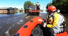 Fire Department first responders in flood waters