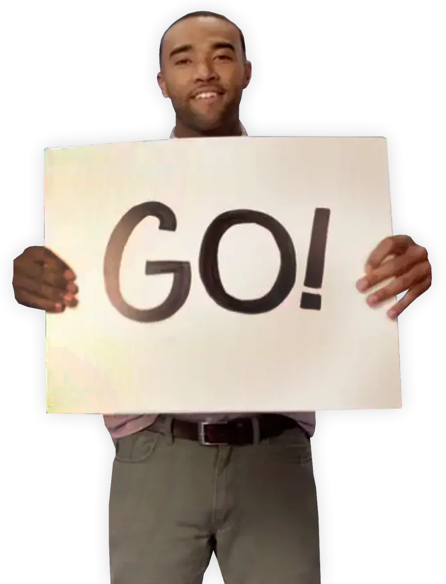 Man holding sign that says "GO!"