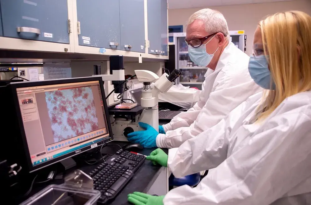 Plum Island Animal Disease Center / PIADC scientists examine materials.
