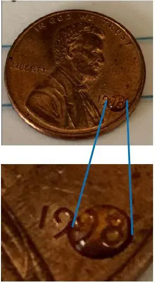 Image of a one-cent penny. Image of a drop a saliva on a penny. 