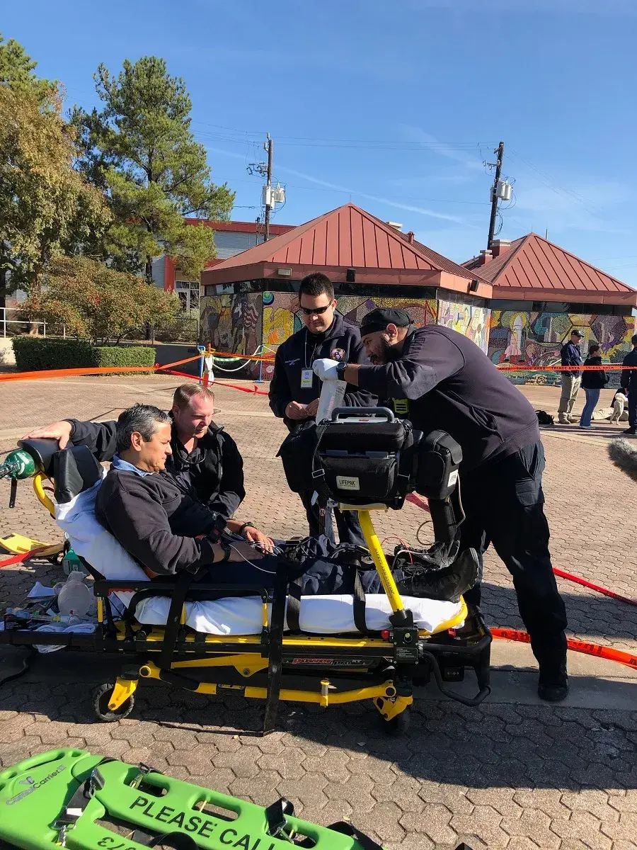 EMT responders treated a simulated victim; vital sign information from multiple simulated patients being transmitted was transmitted wirelessly to EMTs conducting  triage. 