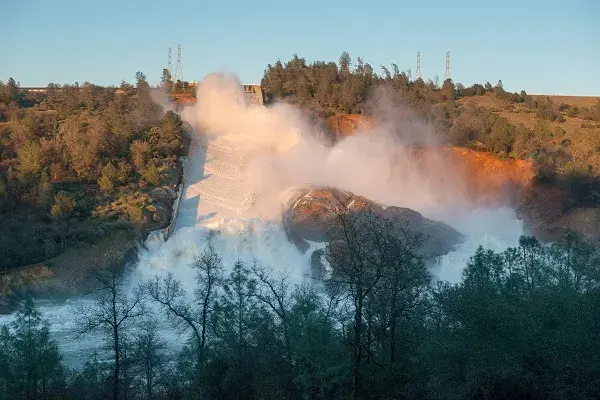 Water flowing from the eroded overflow spillway of Oroville Dam, CA. February 11, 2017