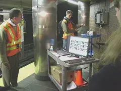 Researchers collect data during a study on airflow in Boston’s subway system.