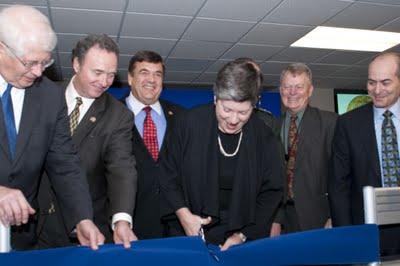 Secretary Napolitano cutting the ribbon for the new NCCIC.